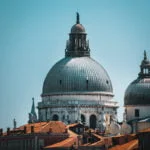 Close up of Basilica Di Santa Maria Della Salute dome from Accademia Bridge in Venice